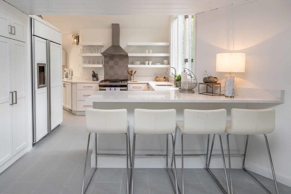 Kitchen Has Breakfast Bar and Professional Quality Appliances