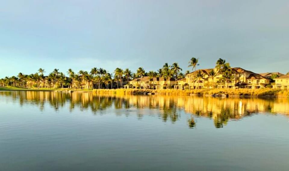 Fairway Villas reflected in the evening sun on Kings' Lake