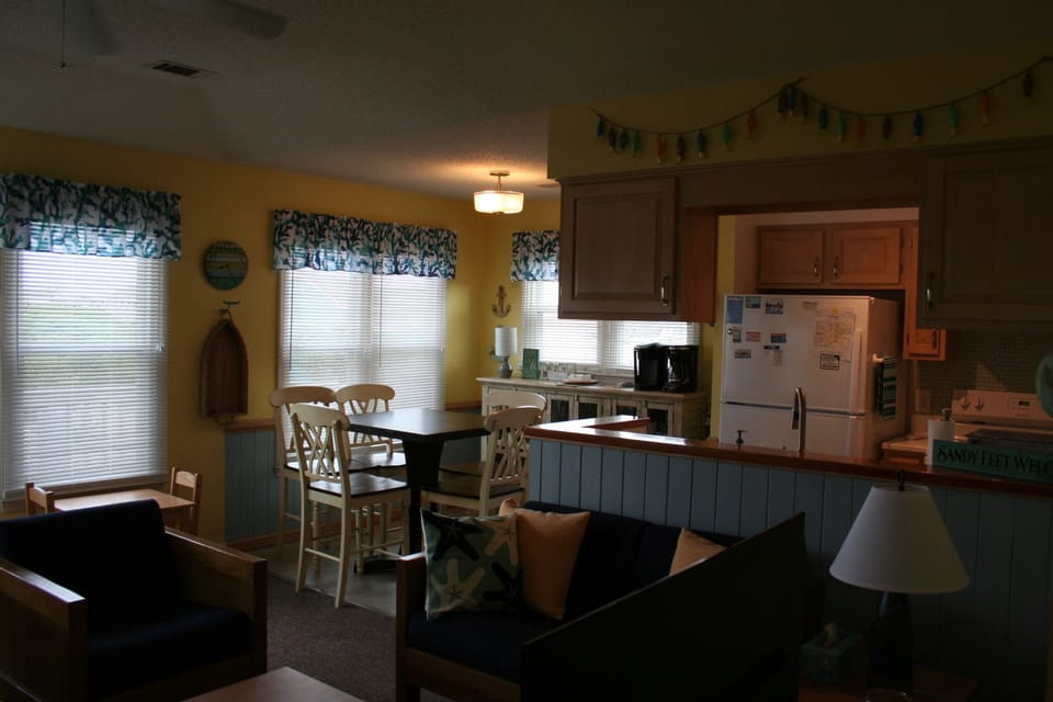 View from family room into kitchen/dining area - table expands to seat 8