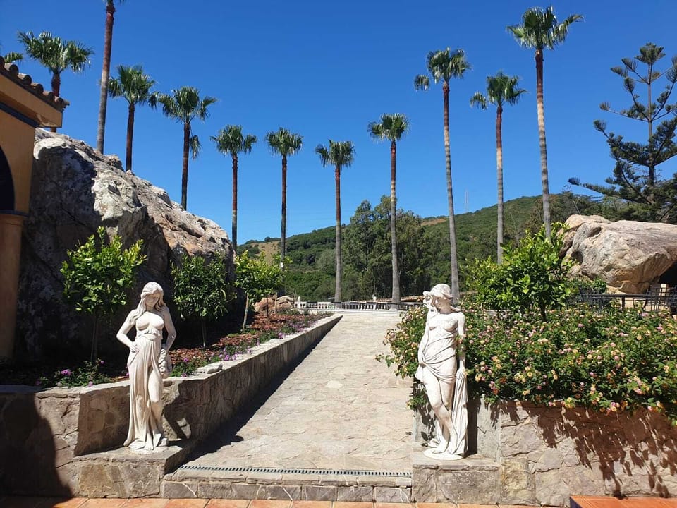 Romantic entrance from courtyard through to the pool and BBQ area