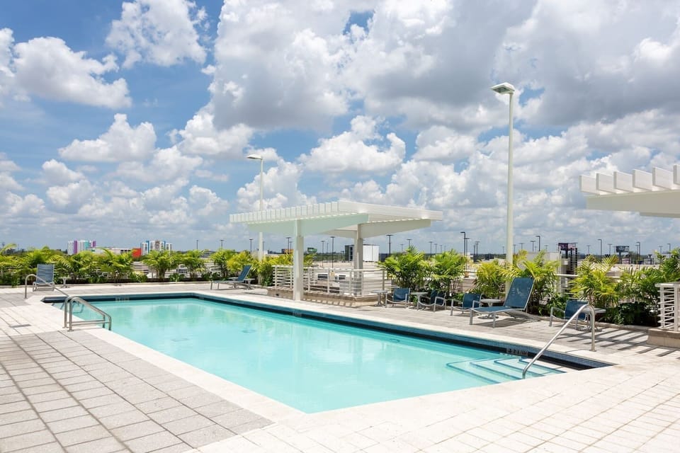 Swimming pool directly  accessible from the patio terrace.