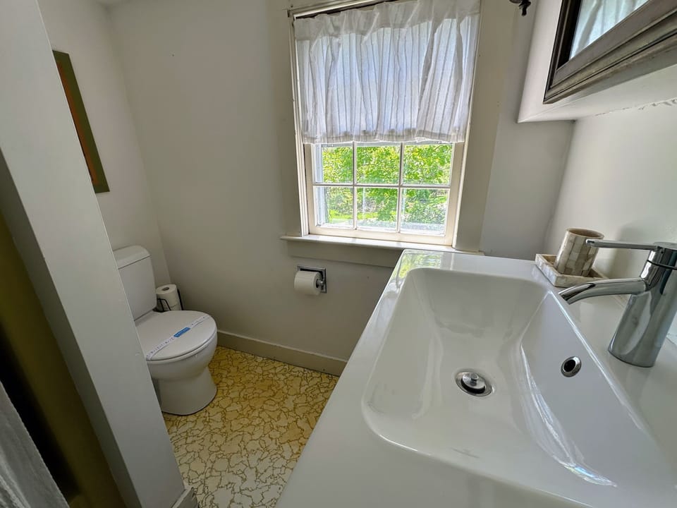 Second floor bathroom with Tub shower combo
