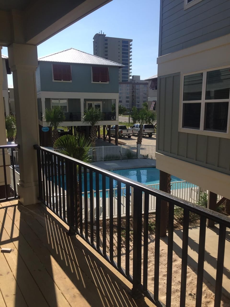 Enjoy a view of the pool while you sit on the balcony.