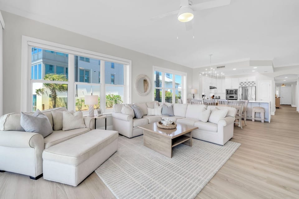Living area with new luxury vinyl plank flooring through the 2200 sq ft property