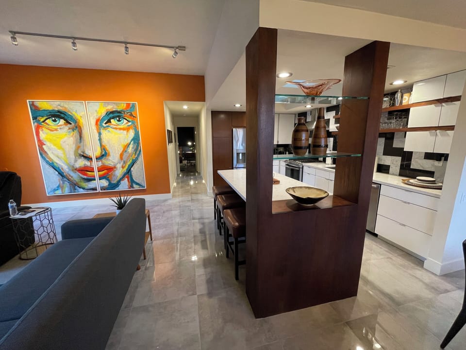 Gleaming floors and beautiful artwork throughout.