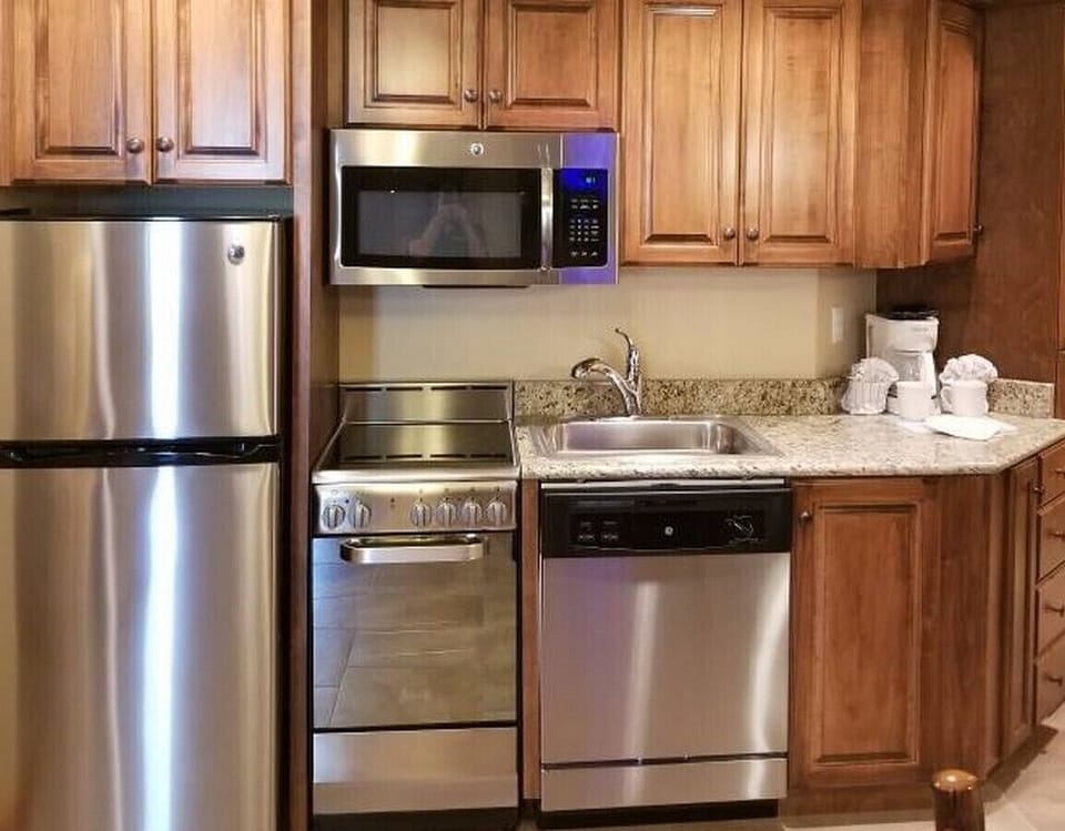 Kitchenette In This Unit ~ Our new unit has complete stove & nice refrigerator!
