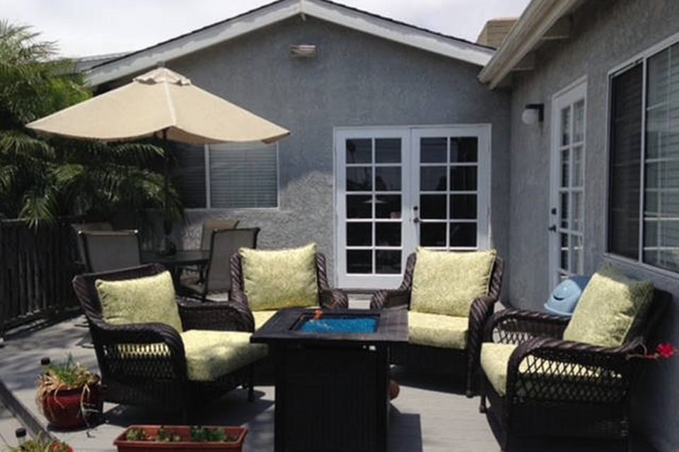 Back deck with firepit and seating for 8. BBQ, trampoline and basketball hoop. 
