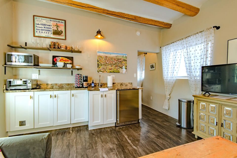Kitchenette | TV | Hall to Bedroom
