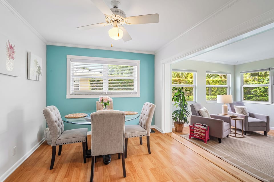Breakfast nook leading into sunroom