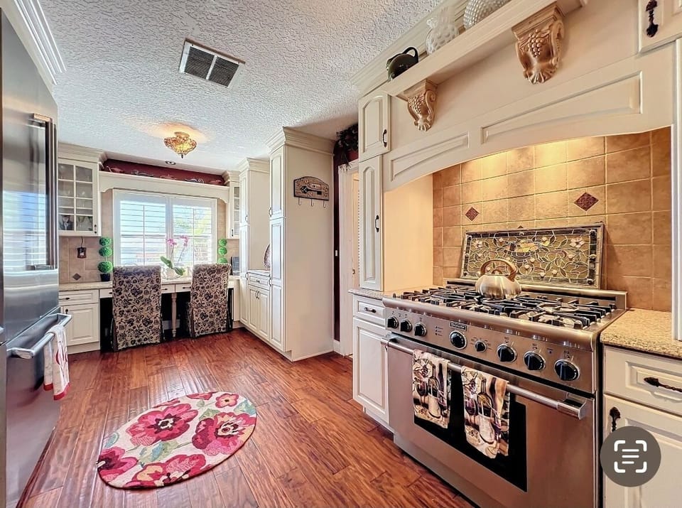 Kitchen with eat in area over looking Lake Dora