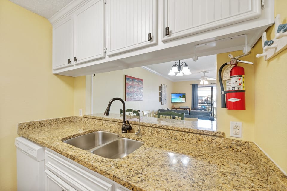 Your granite-topped kitchen opens to the living area, perfect for preparing meals while staying connected with loved ones.