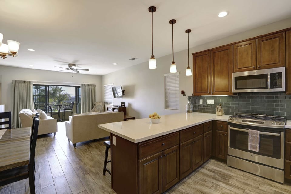Primary living area is on second level. Living room, kitchen and dining. Dining table for 6 plus bar stools.