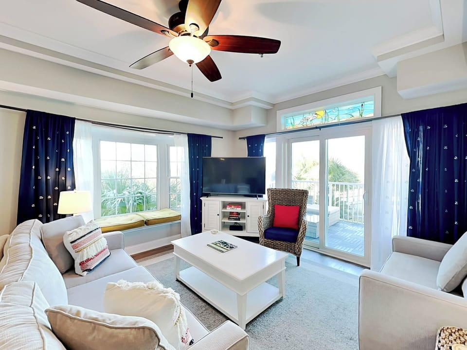 Bay View Villas 105 - Corner unit with bright living area and views of the bay