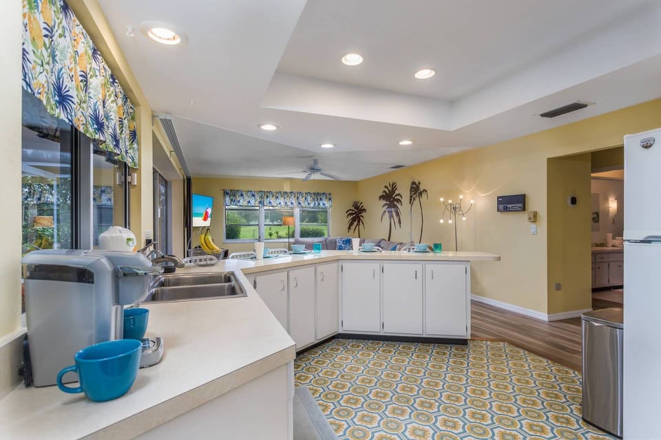 spacious kitchen with everything you need to prepare meals at home.  Toaster, blender, two coffeemakers, dishes, glasses etc are all included.