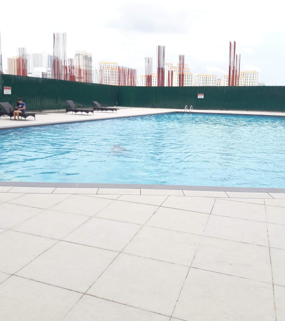 The pool is on the 5th floor of the building.
