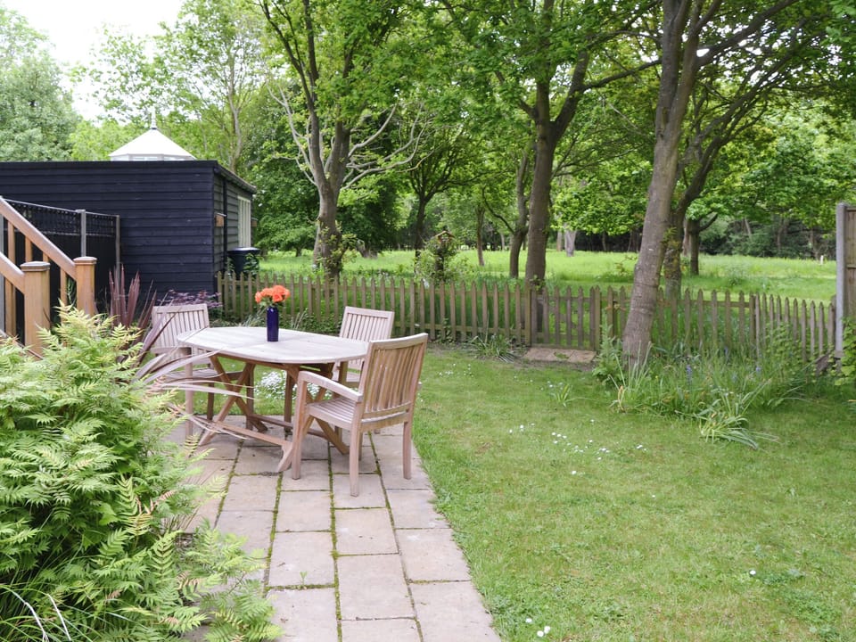 Patio and garden area | Oak View Loft - Stone House Farm, Lessingham, near Stalham