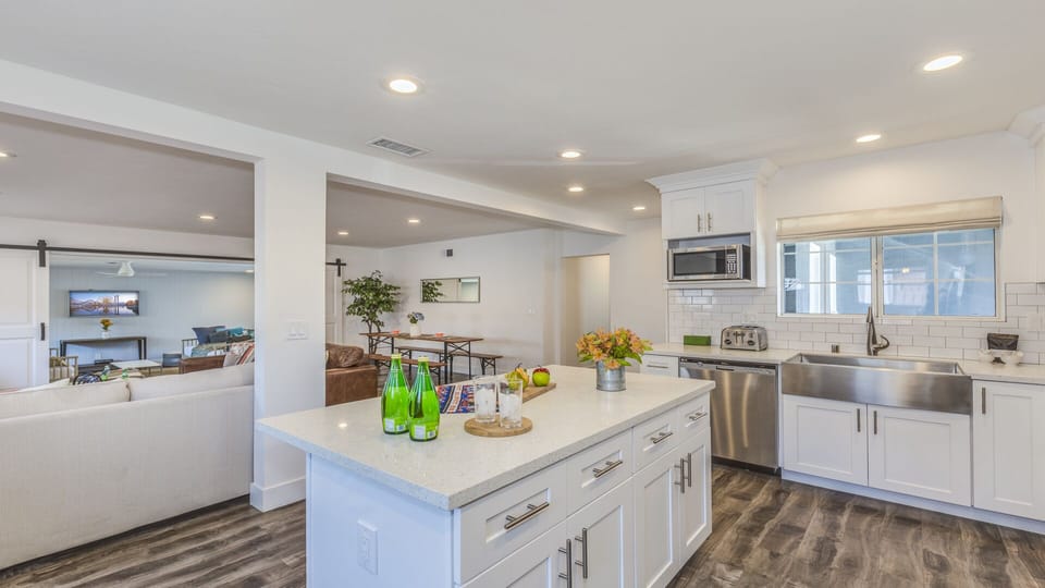 - Fully equipped kitchen with stainless steel appliances and island   - Bright open layout connects easily with dining and living areas   - Modern design makes cooking and entertaining easy for everyone