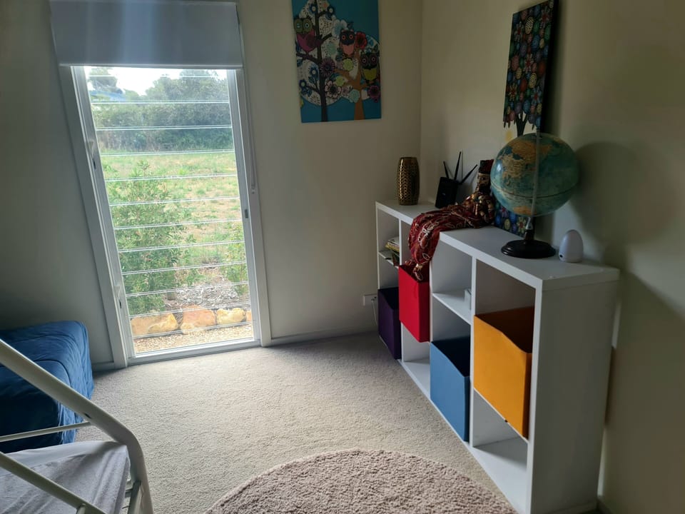 Children's bedroom with bunk beds. Single double and trundle