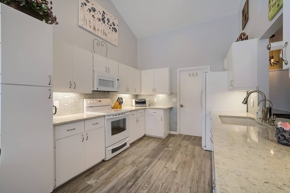This well-equipped kitchen includes all major appliances and ample cabinet space for your convenience.