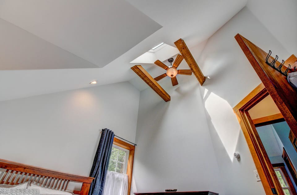 2nd bedroom - vaulted ceilings...both upstairs bedroom are vaulted with beams