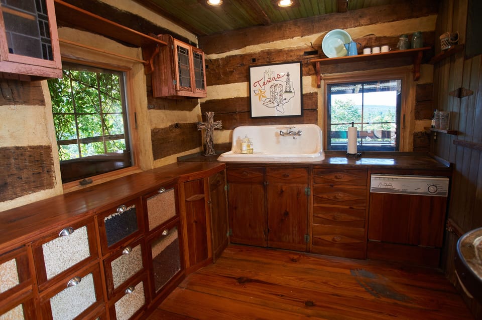 Take a gander at this antique sink - perfect for this historic kitchen. 
