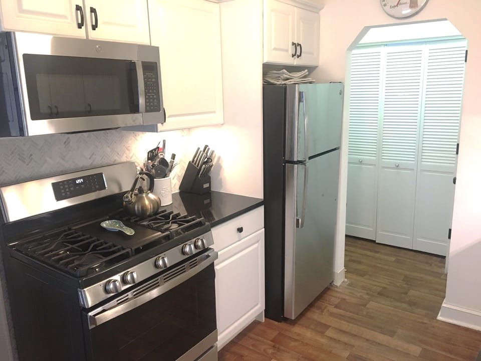 Updated/remodeled kitchen with modern stainless steel appliances.