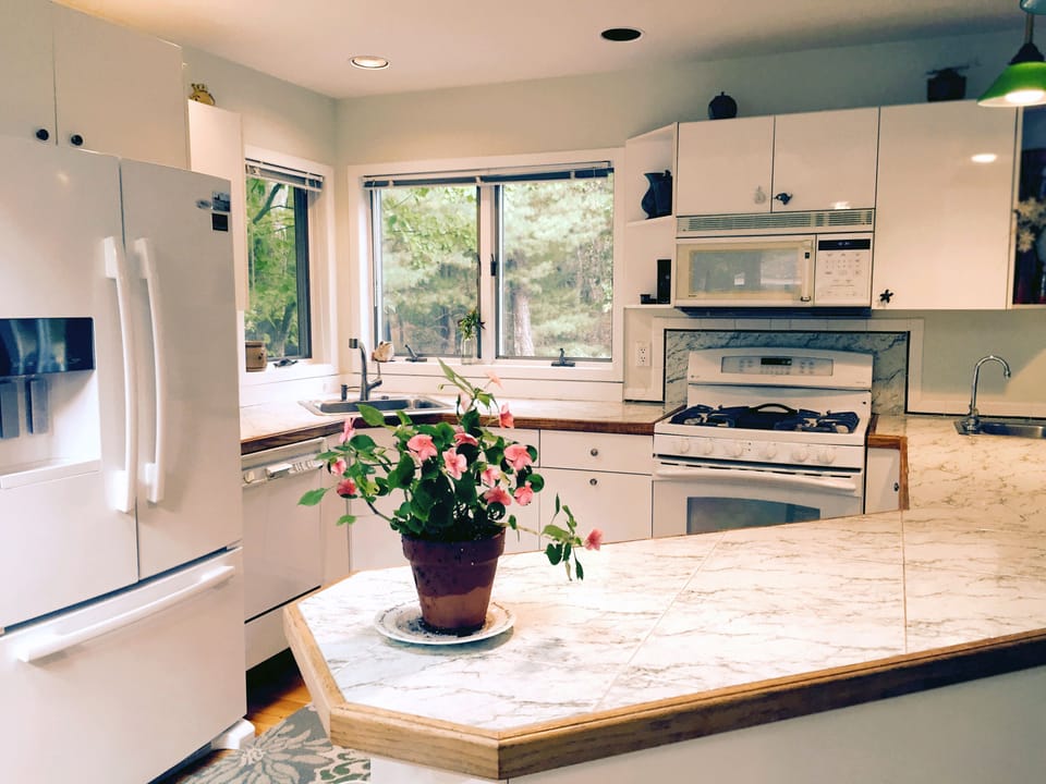 Kitchen with entertainment counter.