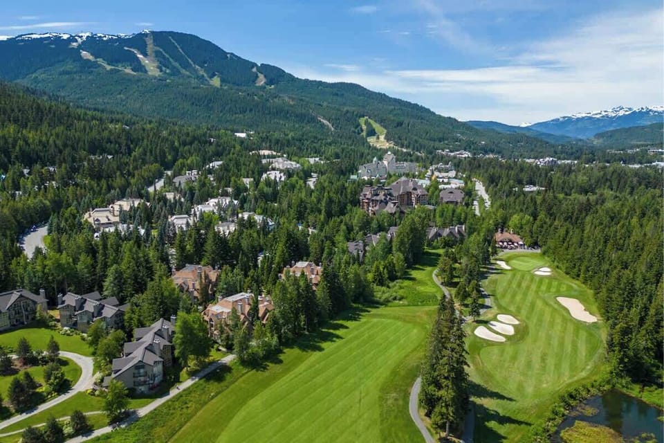 - Aerial view showcasing Whistler golf course and mountain peaks  
- Steps from trails, slopes, and world-class outdoor activities  
- Surrounded by lush greenery and breathtaking panoramic views 