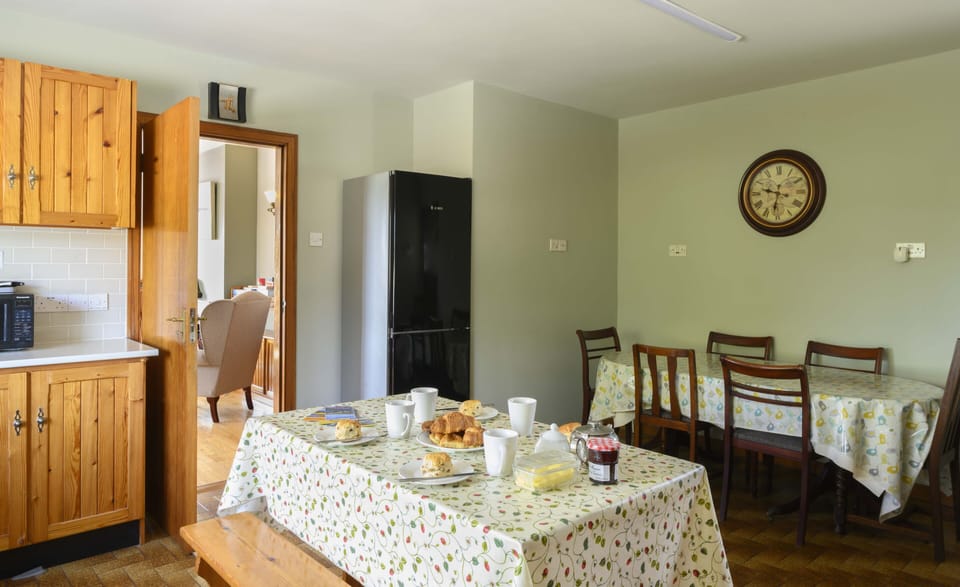 original handmade kitchen with dining tables to seat up to ten people