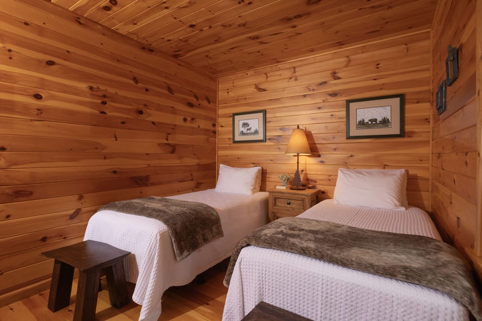 Guest bedroom with 2 XL twin beds, ample closet storage