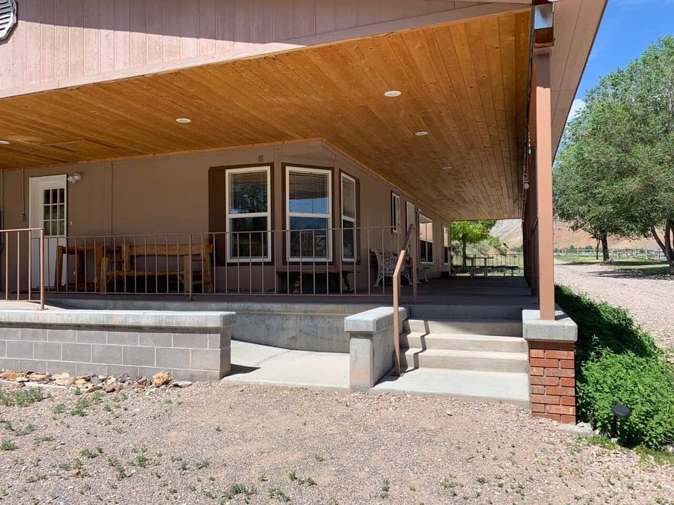 View from the 2 car parking space and side entrance. 