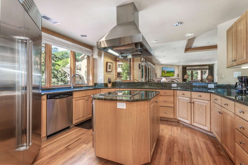 Roomy kitchen with substantial counter space, Gaggenue and SubZero appliances.