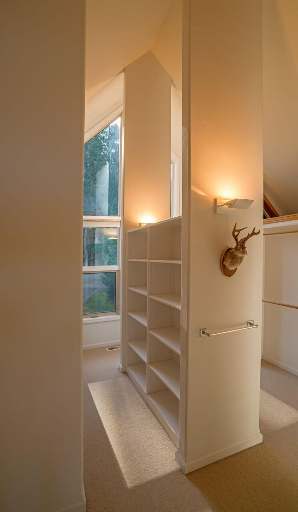 Huge master closet area with built in ironing board 