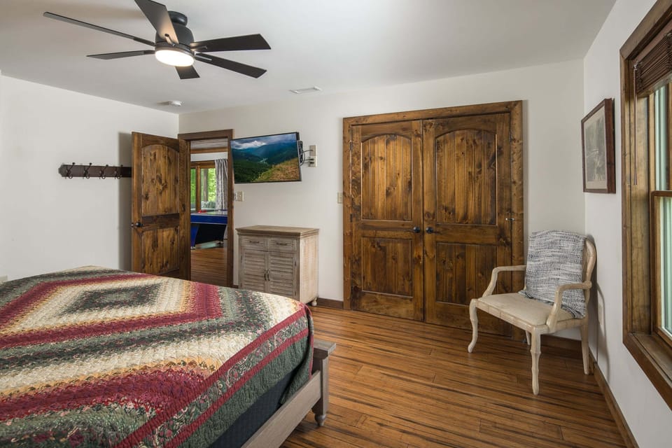 Private king bedroom with shared full bathroom access