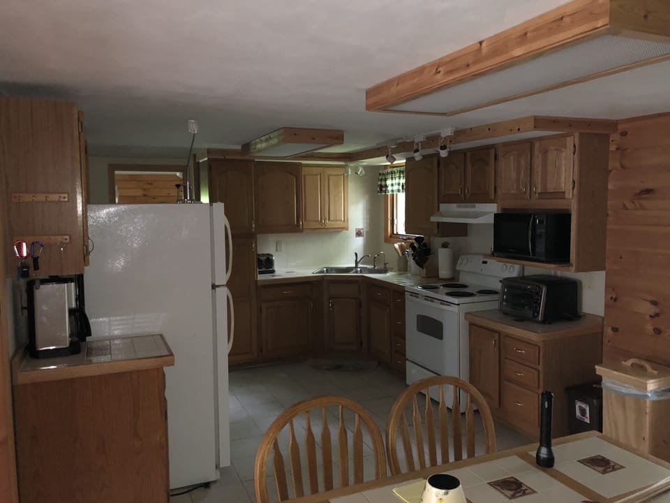 Stocked Kitchen with Range, Microwave, Refrigerator, Coffee Maker