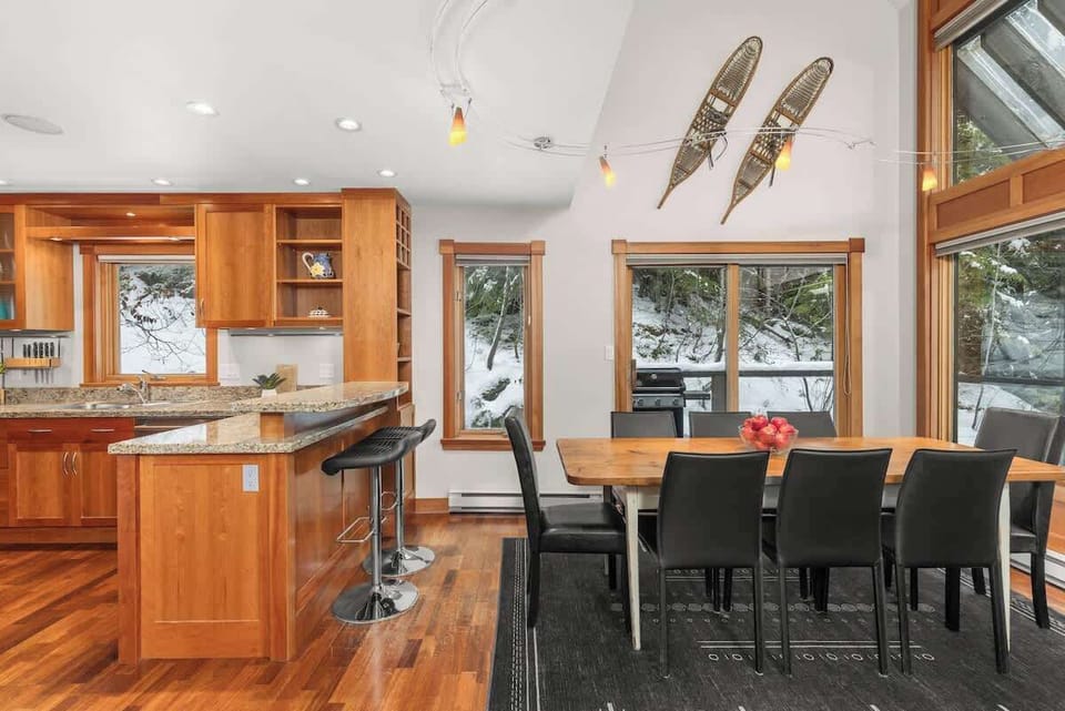 Open-concept kitchen and dining areas