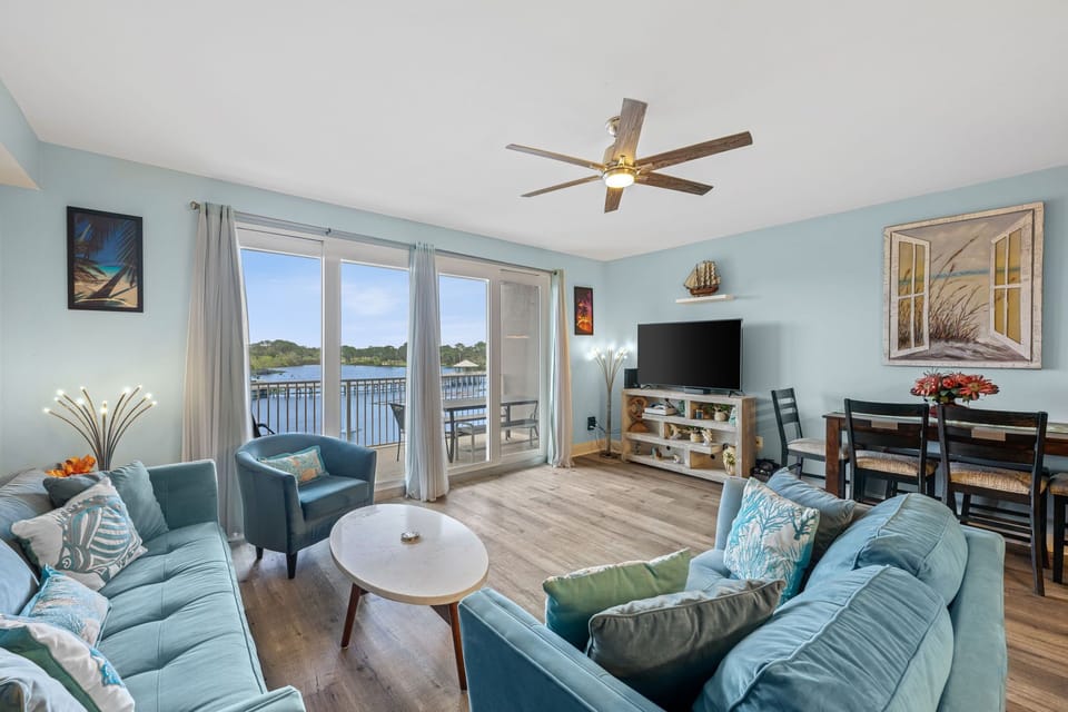 expansive windows, a view of the lake, and plenty of room for everyone.