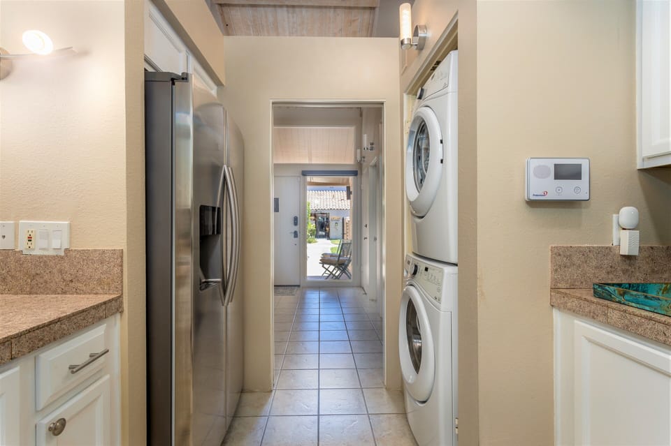 Kitchen with view of Refrigerator, Washing Machine and Dryer