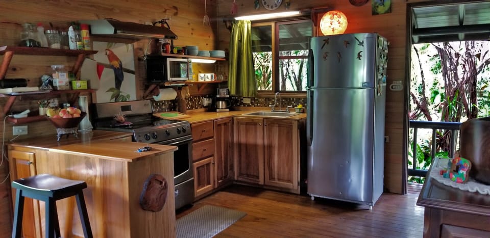 Fully equipped kitchen.  Large fridge, oven, coffee maker, rice cooker, and more
