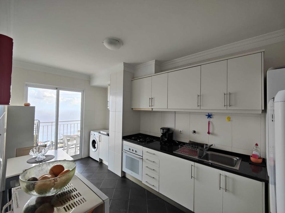 Well equipped kitchen with sea view