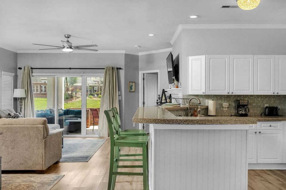 Kitchen features breakfast bar for additional seating