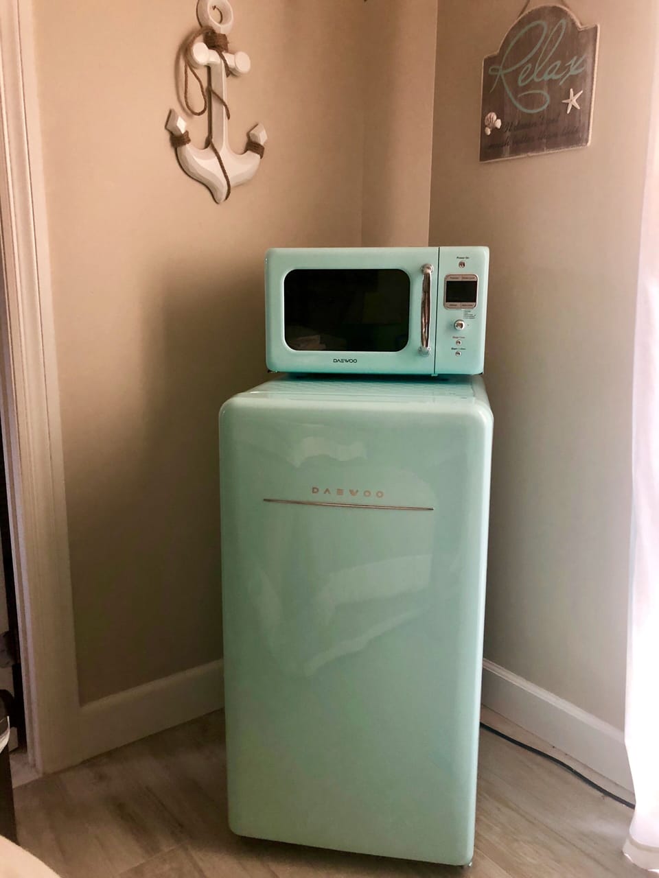 Roomy fridge w/small freezer & microwave.