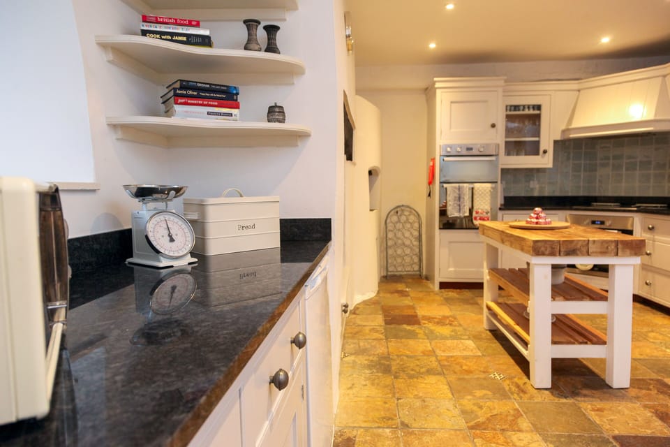 Full kitchen fitted with all mod-cons and ample crockery for 18