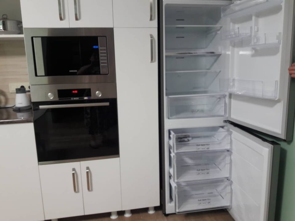 built-in microwave and built-in oven. Brand new refrigerator Samsung.