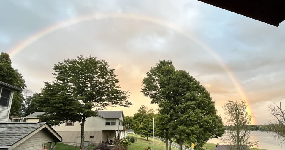 Rainbow view off cabin porch