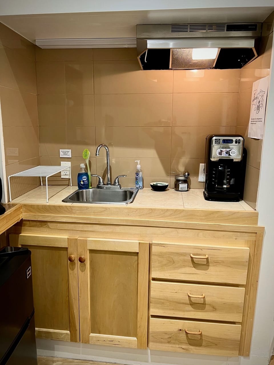 Coffee maker and a small sink for your convenience at Marfa House La Junta