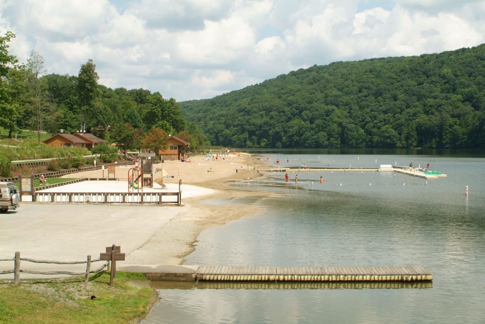 Canoeing, swimming, fishing on picturesque 68-acre lake just 2 miles from lodge!