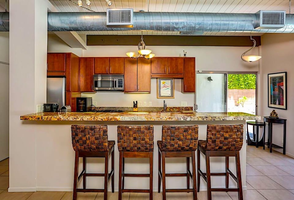 Breakfast bar/workstation with granite countertops