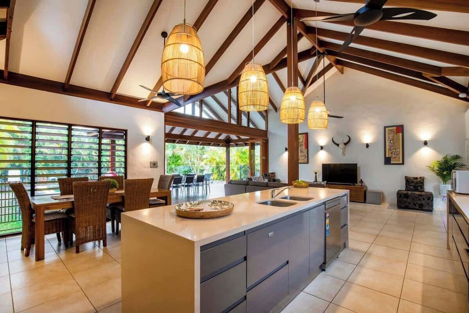Huge living area flowing seamlessly to the outdoor pool deck via bi fold doors which can be closed on hotter days.