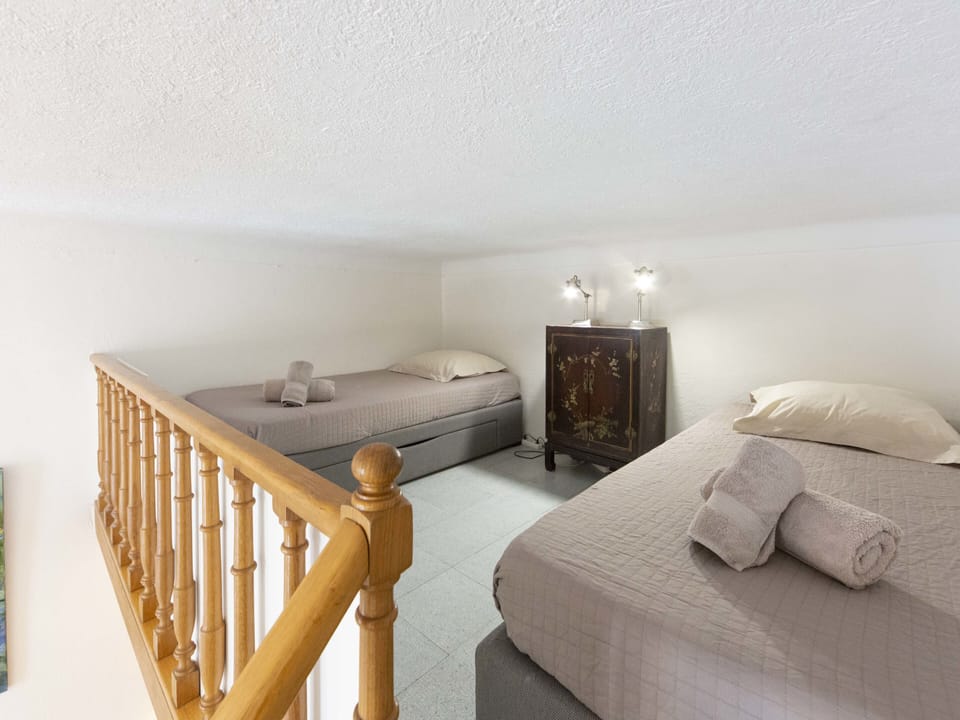 2 singles beds in mezzanine